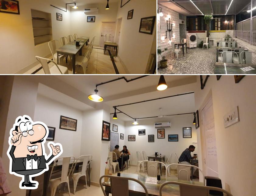 Take a seat at one of the tables at Nandi Restaurant