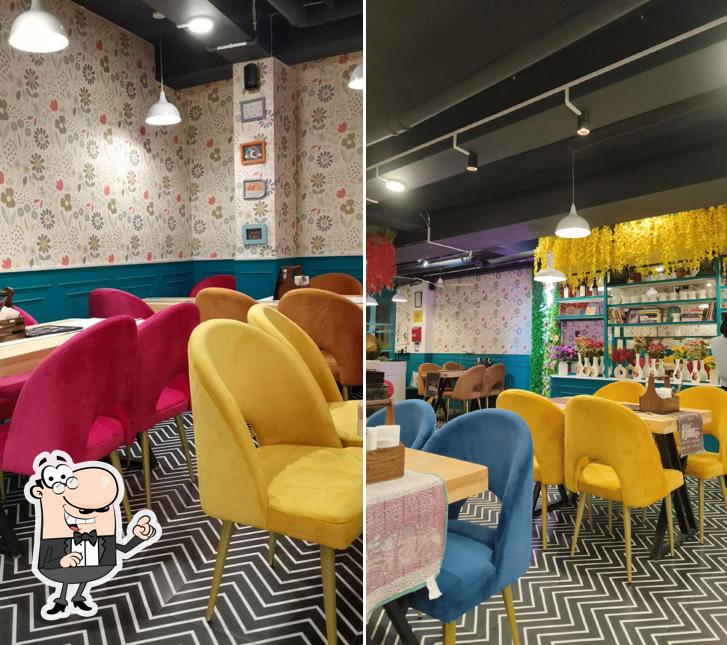 The interior of CAFE FRIDAY - Best Restaurant In Solan( Most Instagrammable Cafe ) 100% Vegetarian