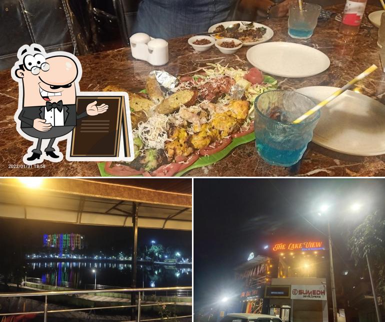 The image of The Lake View Dine & Restaurant’s exterior and dining table