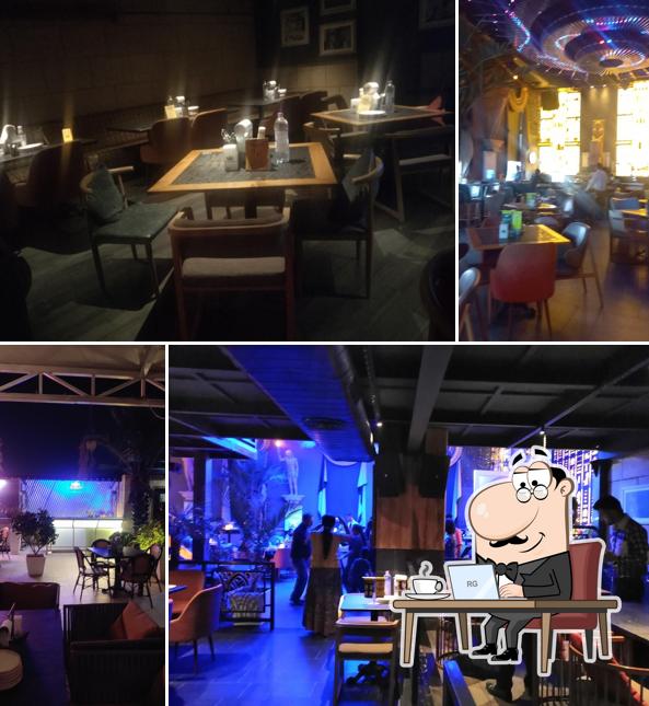 Take a seat at one of the tables at Pyramid Ludhiana Cafe Lounge Bar Microbrewery Nightclub Sky bar Restaurant Take a seat at one of the tables at Pyramid Ludhiana Cafe Lounge Bar Microbrewery Nightclub Sky bar Restaurant