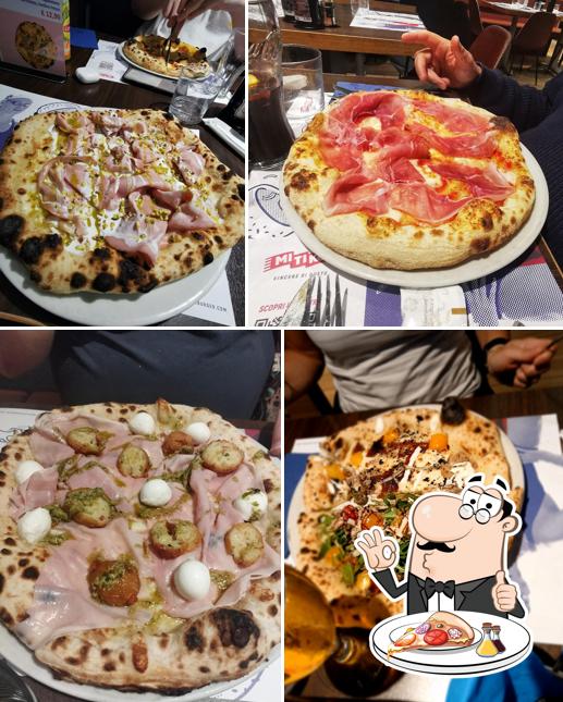 Prenditi una pizza a Mitiko - Ristorante sportivo, Pizzeria e Burger