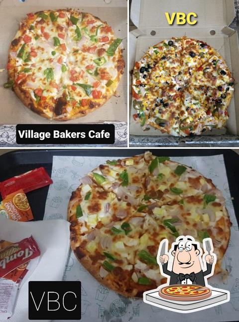 Try out pizza at Village Bakers And Cafe