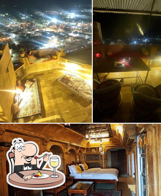 The picture of desert haveli roof top restaurant’s food and interior