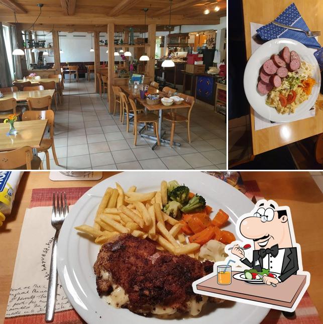 Dorfcafé Restaurant Pizzeria Crodino si caratterizza per la cibo e interni