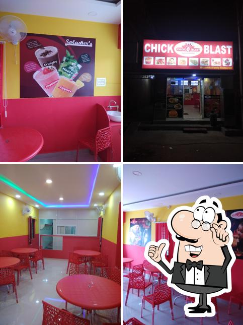 Take a seat at one of the tables at CHICK BLAST Family Resturant