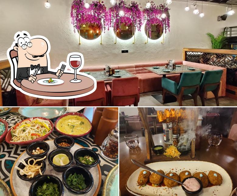 The photo of food and dining table at Thyme & Whisk - Fine-Dine Restaurant