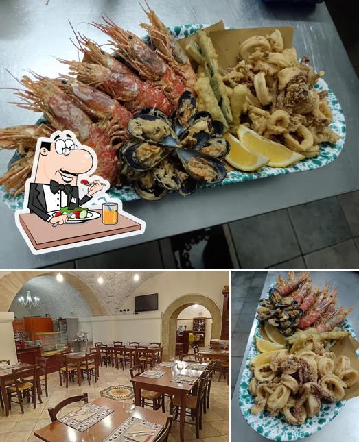 La immagine della cibo e interni di La Grotta