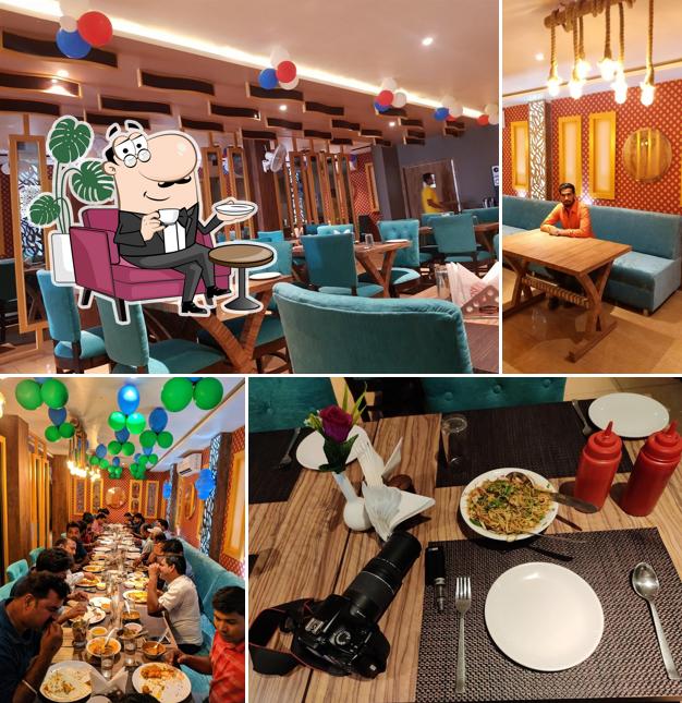 Take a seat at one of the tables at Hotel Raj Palace Azamgarh