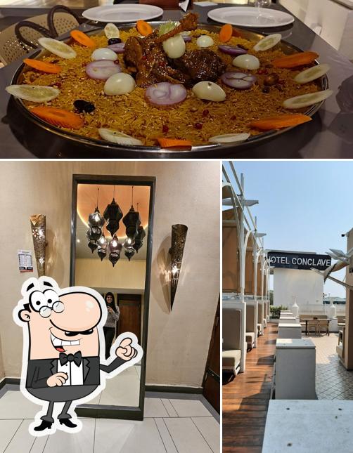 Among different things one can find exterior and food at Qasbah Sky Lounge