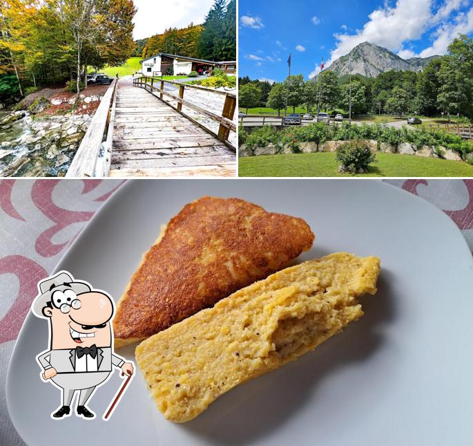 Questa è la immagine che mostra la esterno e cibo di Osteria con Cucina "Monte Jof"