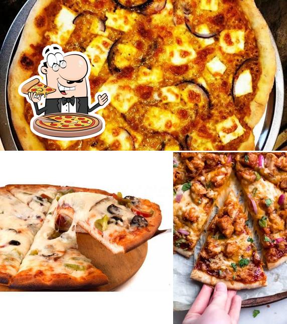 Try out pizza at K.F.C AL-BAIQ