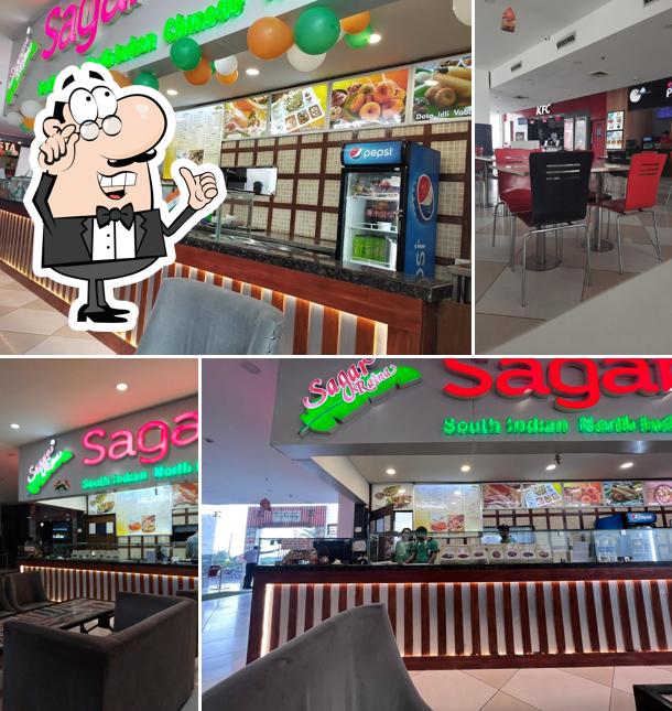 Take a seat at one of the tables at Sagar ratna