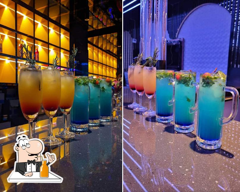 Enjoy a drink at Hydra Club And Sky Lounge