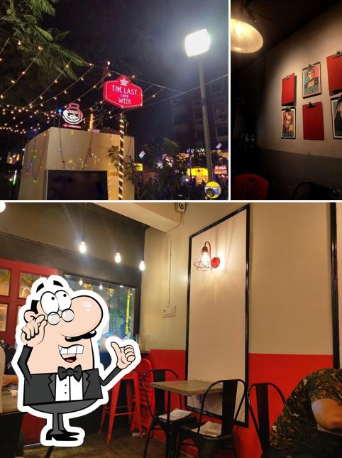 Take a seat at one of the tables at The Last Week Cafe