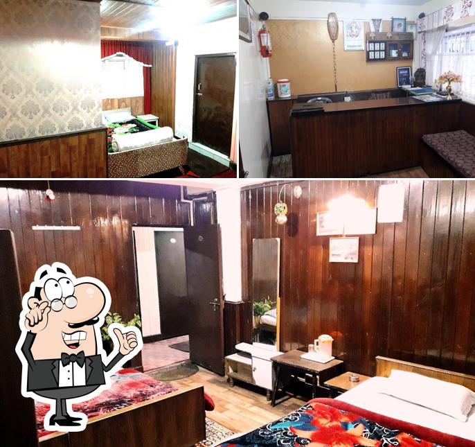 Take a seat at one of the tables at Hotel Dil