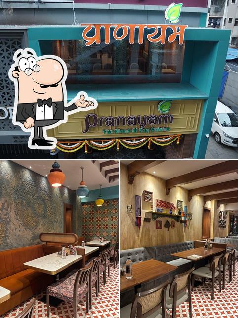 The photo of Pranayam Restaurant (Pure Veg)’s interior and exterior