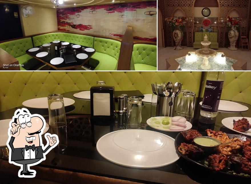 Take a seat at one of the tables at Bhiwandi Darbar -