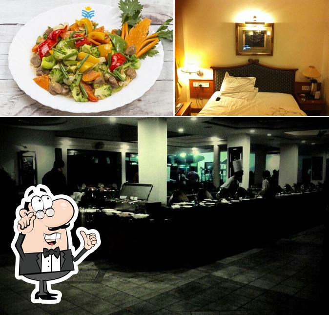 Check out the picture depicting interior and food at Maurya Rajadhani