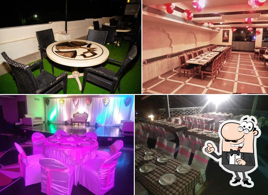 Take a seat at one of the tables at Celebrations Hotel