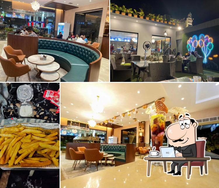 Take a seat at one of the tables at Dessert Bar & Cafe by Basant