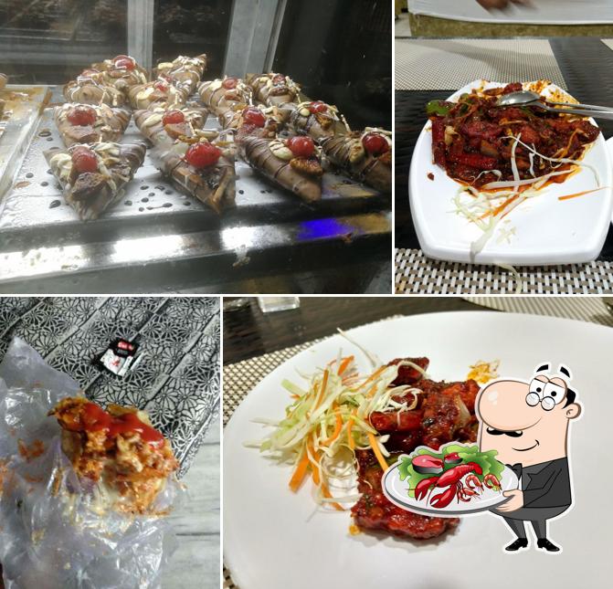 Get different seafood dishes offered by Pariwar's Have More Restaurant & Bakers