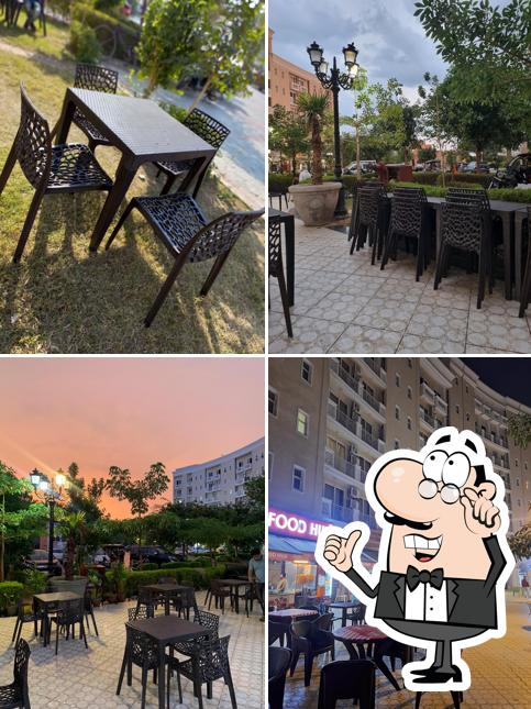 Take a seat at one of the tables at Badri Vishal Food Hub