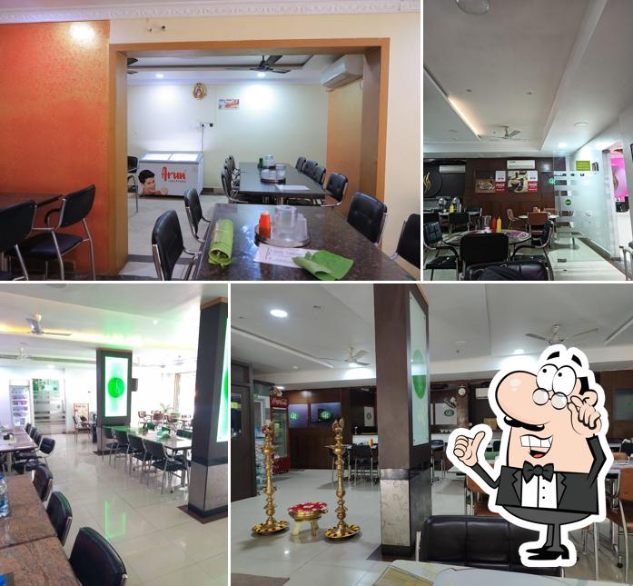 Take a seat at one of the tables at Golden Restaurant