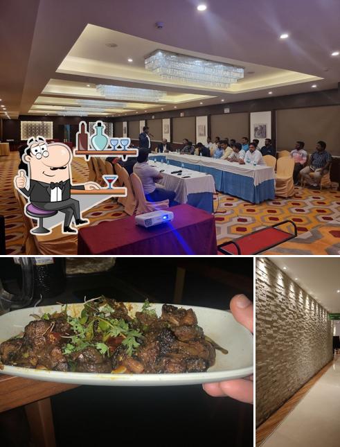Take a look at the image displaying interior and beverage at Flames Bar Hosur