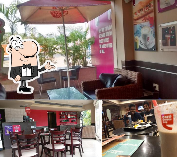 The photo of interior and dining table at Café Coffee Day
