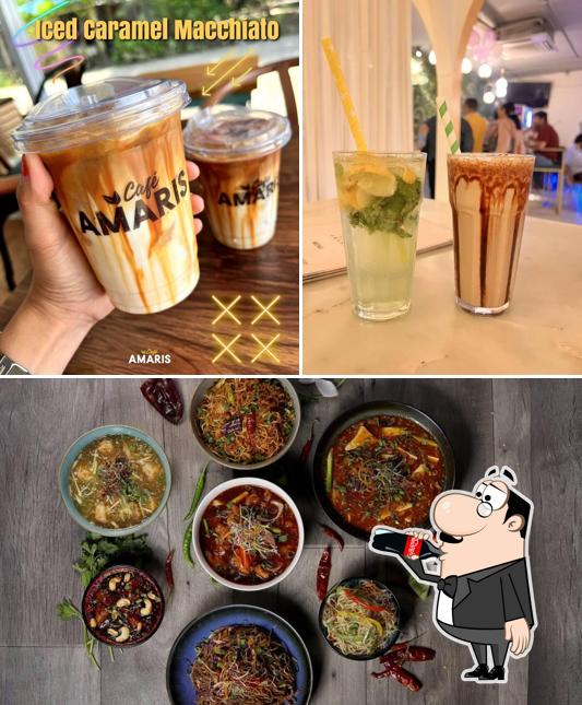 Take a look at the image depicting drink and food at Cafe Amari