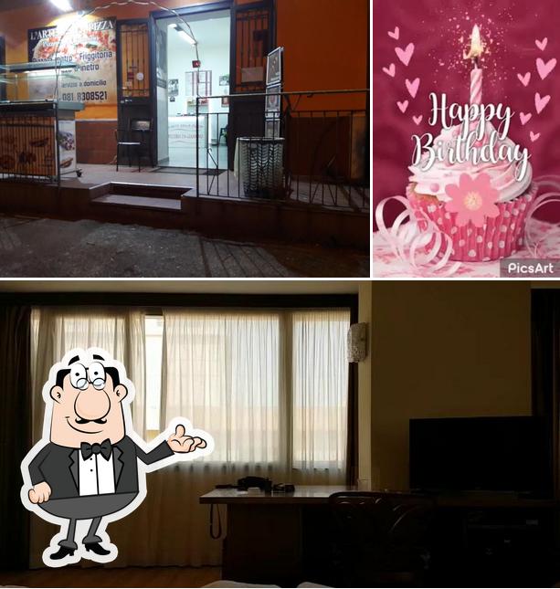 La immagine di interni e torta da L' arte della pizza