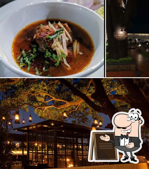 This is the picture displaying exterior and food at Under The Mango Tree - Jehan Numa Palace