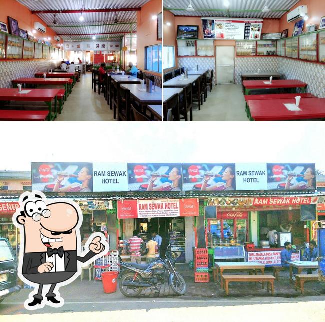 Take a seat at one of the tables at Ram Sewak Restaurant-Pure Veg Restaurant in Bodhgaya I Best Restaurant in Bodhgaya