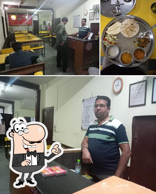 This is the photo depicting interior and meat at Charbhuja Bhojnalay