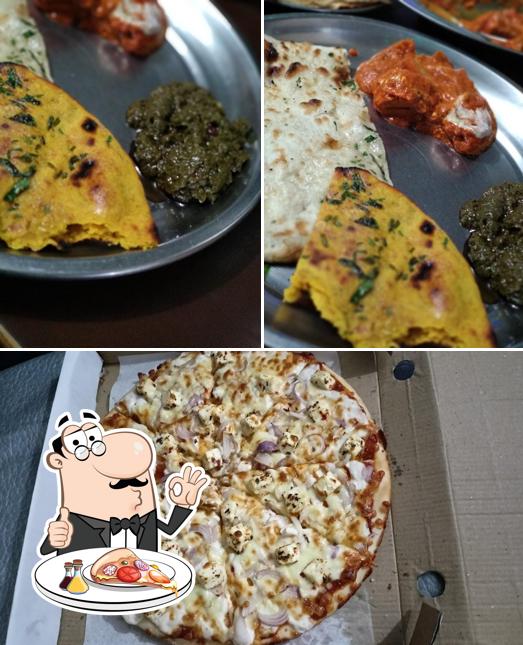 Try out pizza at Mohan Dhaba