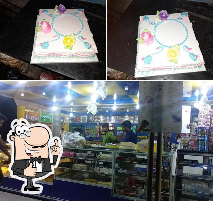 Look at the photo of Sri Raghavendra Sweets And Bakery
