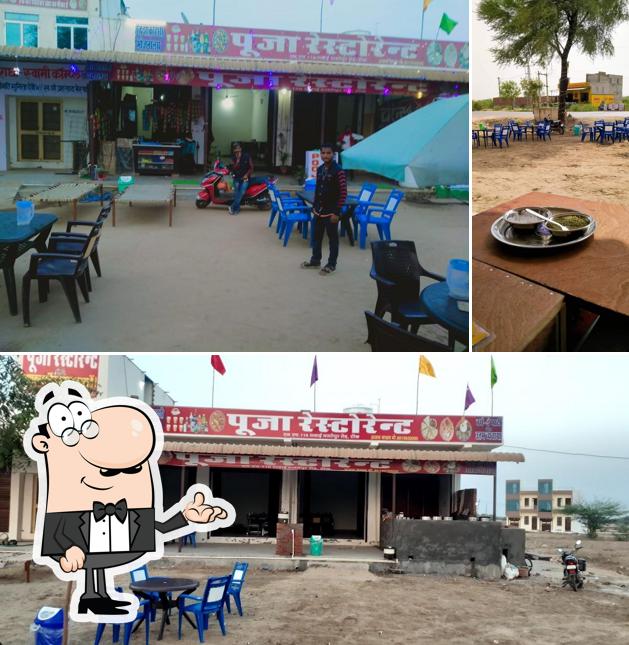 The interior of Pooja Restaurant