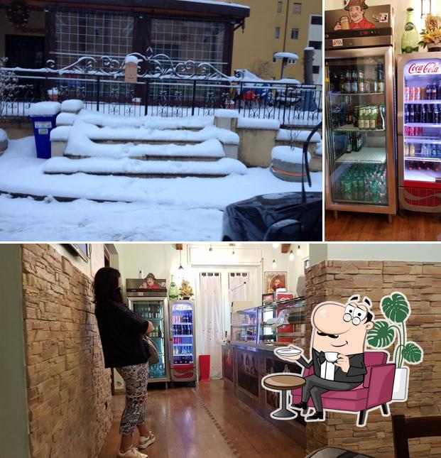 Tra le diverse cose da Pizzeria La Bella Napoli si possono trovare la interni e esterno