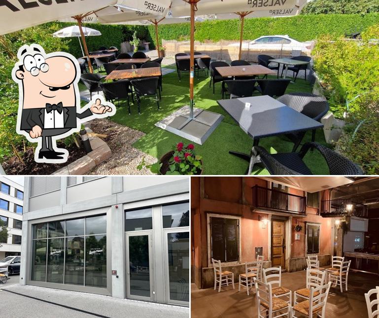 La foto della interni e esterno di Santa Pizza!