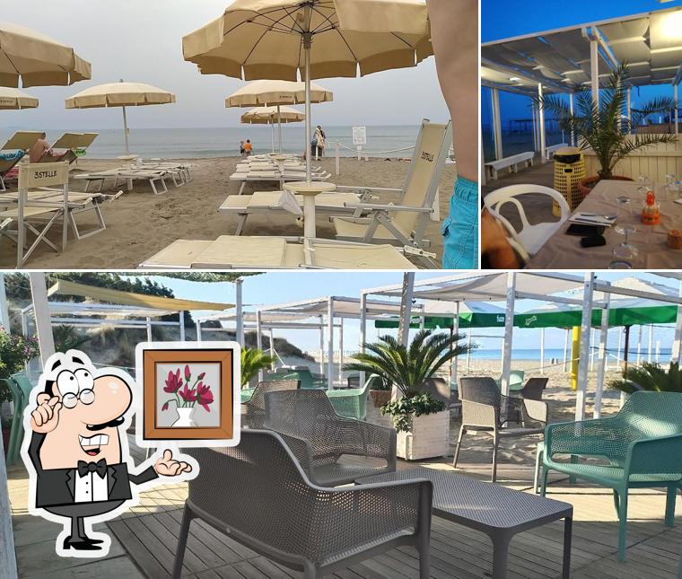Tra le diverse cose da Tre Stelle Beach si possono trovare la interni e tavolo da pranzo