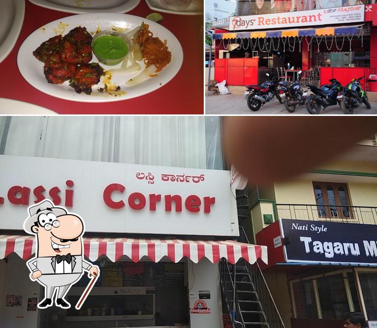 This is the image displaying exterior and food at 7days Restaurant