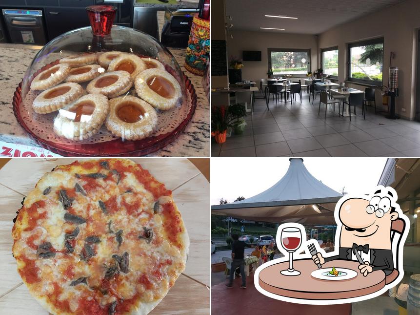 Tra le varie cose da Bar Officina Italia si possono trovare la cibo e interni