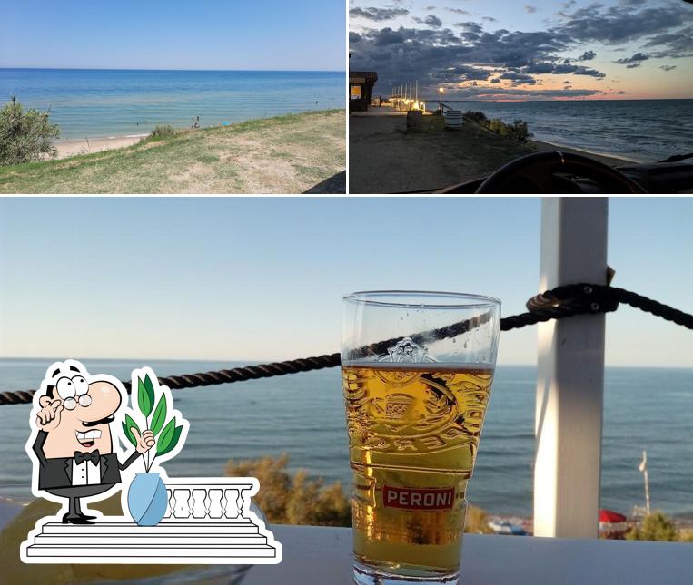 La immagine della esterno e birra di Area Sosta Camper - "Villaggio La Torre" - Petacciato