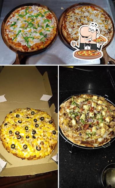 Get pizza at Dominar Pizza