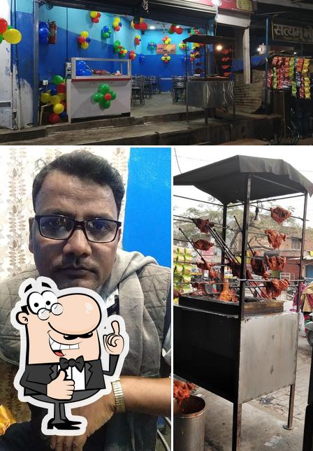 Look at the picture of DAWAT-the veg & non_veg corner