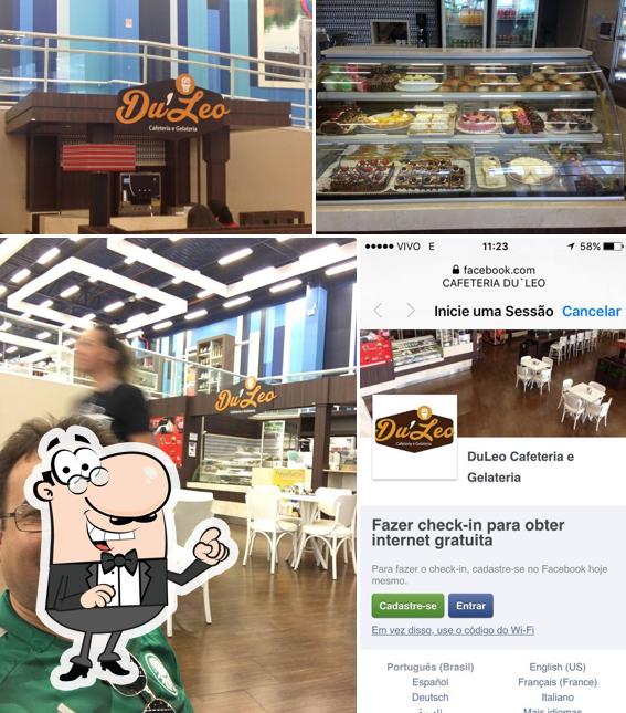 Sente em uma das mesas no Duléo Café Gourmet
