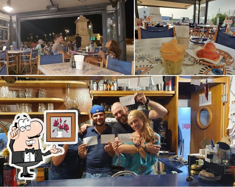 La immagine della interni e tavolo da pranzo di Caffè La Vela