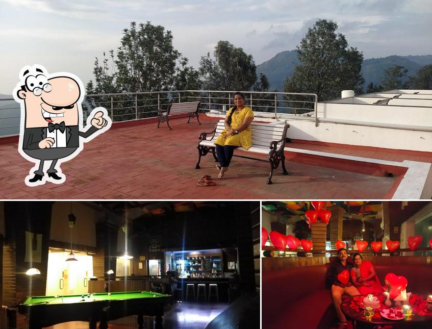 Take a seat at one of the tables at Cloud 9 Lounge Bar