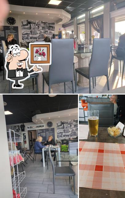 Questa è la immagine che mostra la interni e cibo di El bar dei gnari