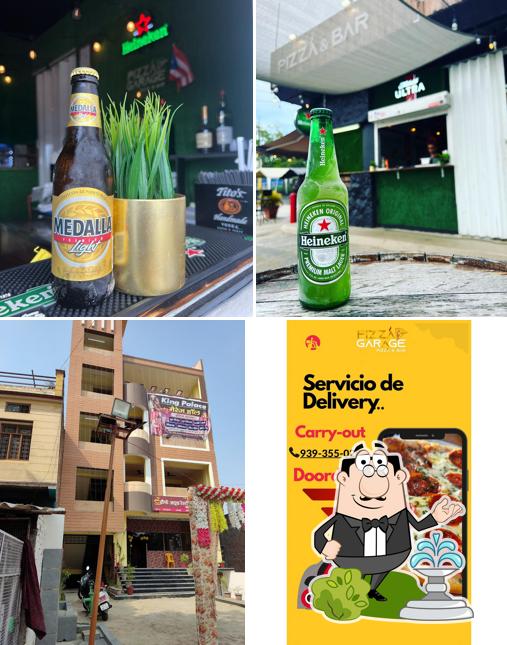 Check out the picture displaying exterior and drink at PIZZA GARAGE SALEMPUR